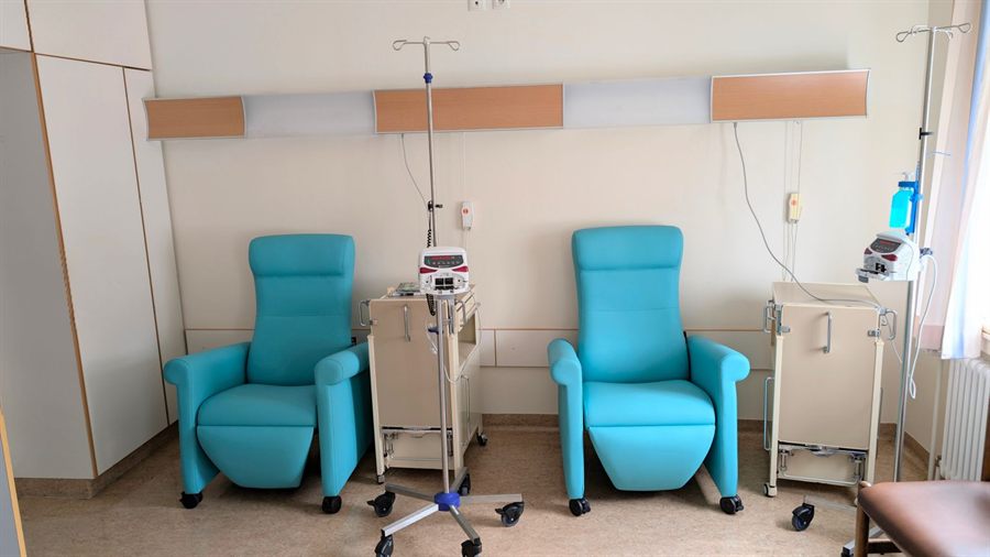 Treatment room with reclining chairs and medical stands